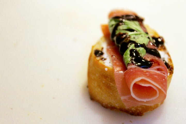 Prosciutto, Basil, Goat Cheese, and Balsamic Glaze Crostini